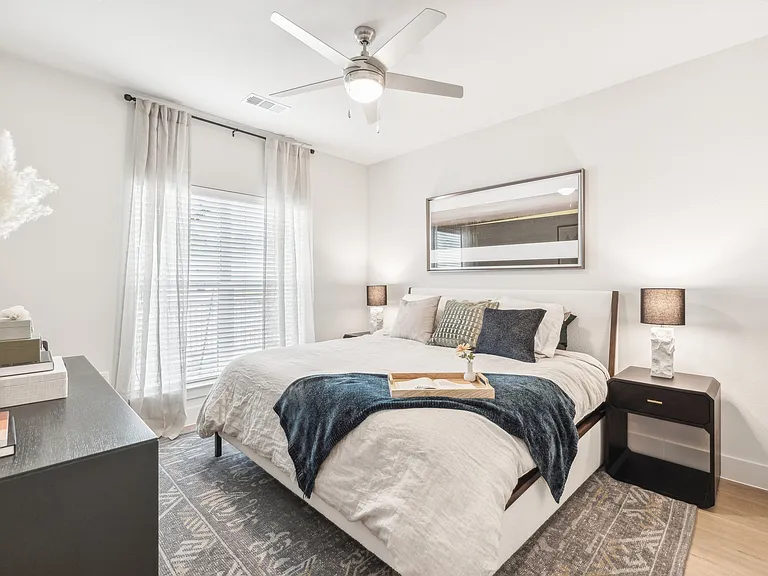 Your Bedroom: Hardwood floors, ceiling fan, and large window