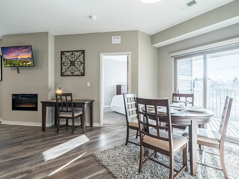 Gather for meals in a bright dining area with seamless access to your private balcony or patio.
