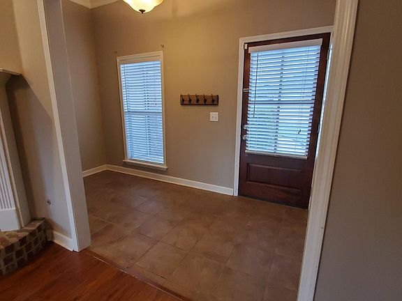 Enter front door into small area