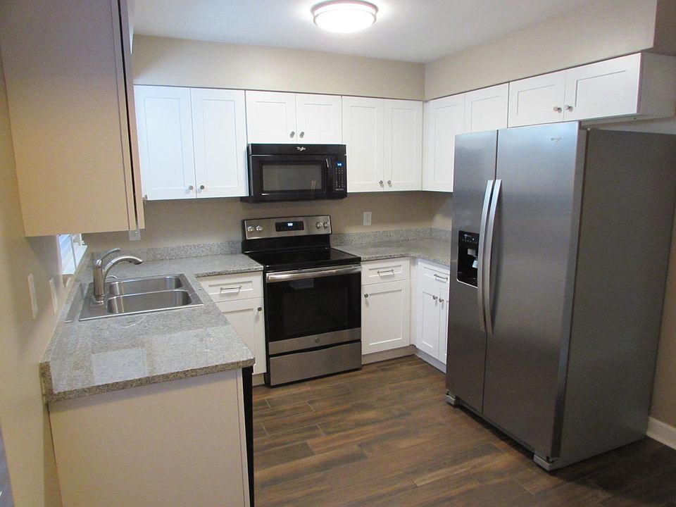 Kitchen with granite countertops.
