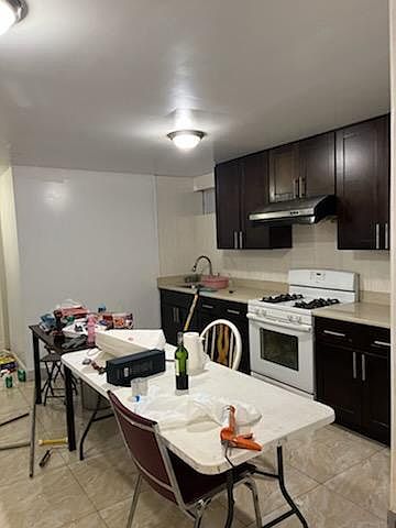 1st image of 5848 193rd St Floor Basement