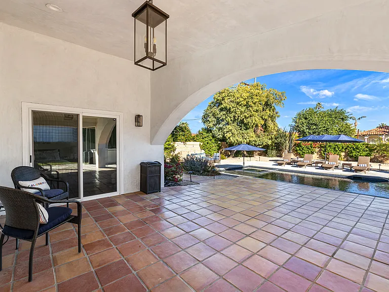 The expansive covered patio is perfect for hosting a yoga session with your loved ones or practice your salsa dancing skills!