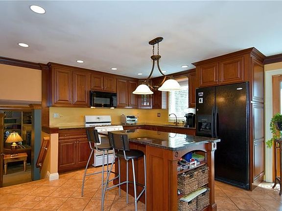 Prepare meals in the spacious kitchen equipped with all appliances.