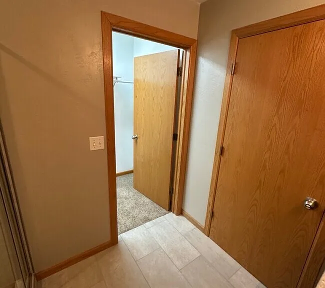 Lare walk in closet off bathroom