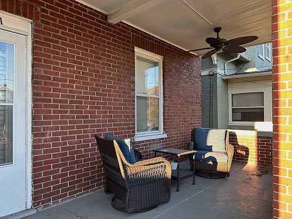 PRIVATE FRONT SITTING PORCH W/ OUTDOOR CEILING FAN!
