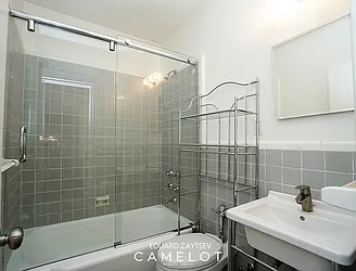 Sold by Camelot Realty Group