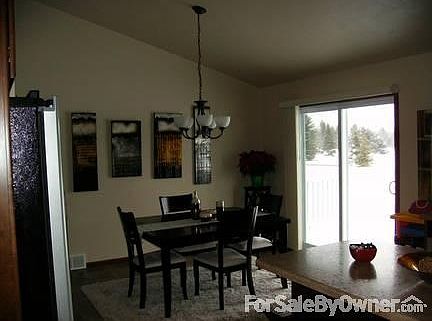 Dining area with patio doors to deck