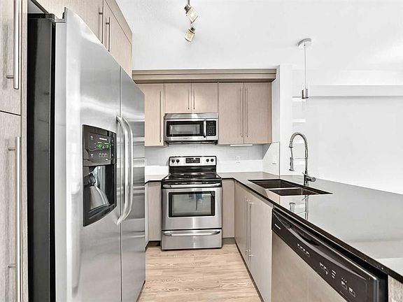 5th image of 11 SW Mahogany Row SE #1115