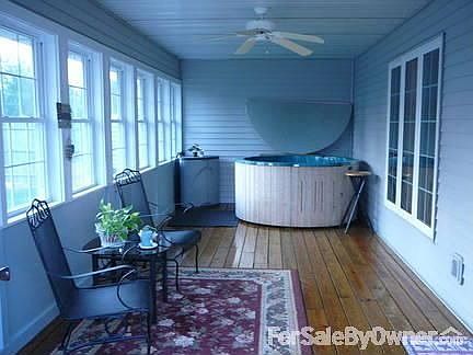 Sun room
						:
						Entering the sun room from the deck in the back yard.