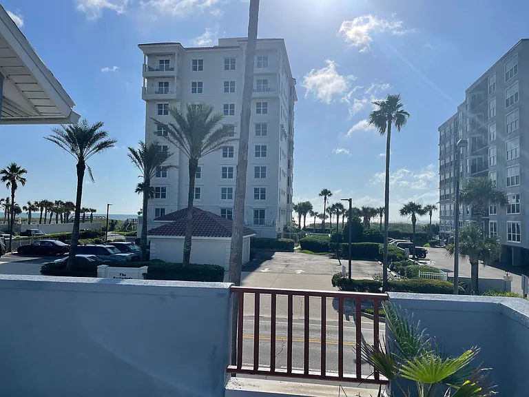 Upstairs deck with ocean view is perfect morning spot for you to wake up sipping coffee while you watch joggers and listen to the surf.