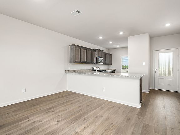 The dining room sits right off of the kitchen.