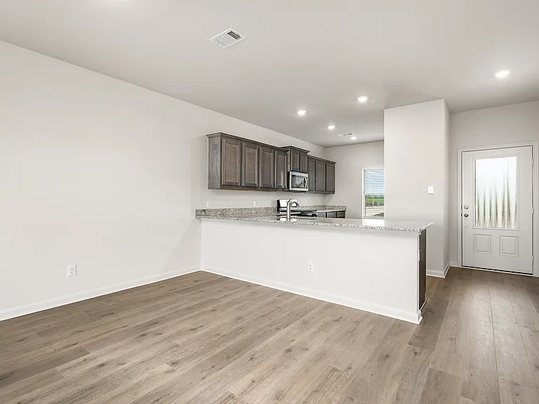 The dining room sits right off of the kitchen.