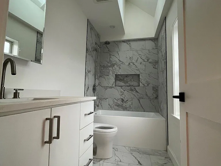Main floor bathroom. Skylight opens by remote control!