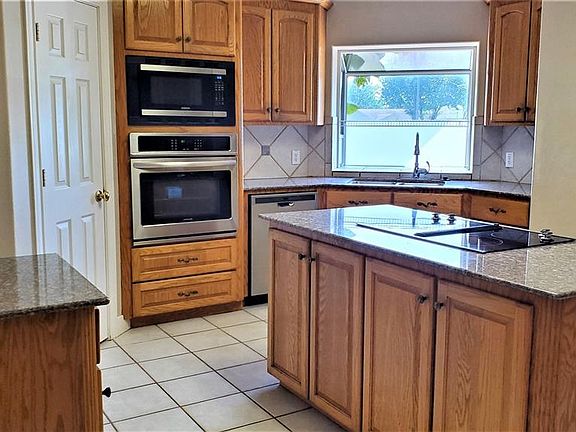 Gourmet kitchen, Stainless Steel appliances.