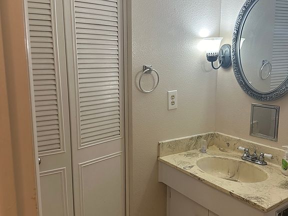 Bathroom and linen closet