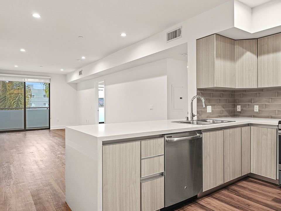 Open-Concept Kitchen, Dining, and Living Room Areas