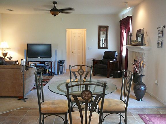 VIEW FROM KITCHEN TO BREAKFAST AREA AND FAMILY ROOM