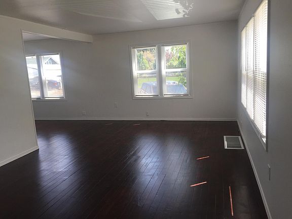 Beautiful hardwood floors in living room and dining room