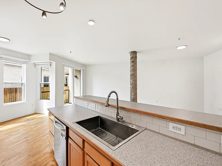 2422 Tremont Pl #103 — Photo 5