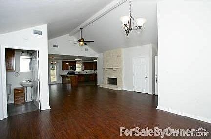 Great Room from Front
						:
						New fireplace and all new floors/fixtures/ceiling fans