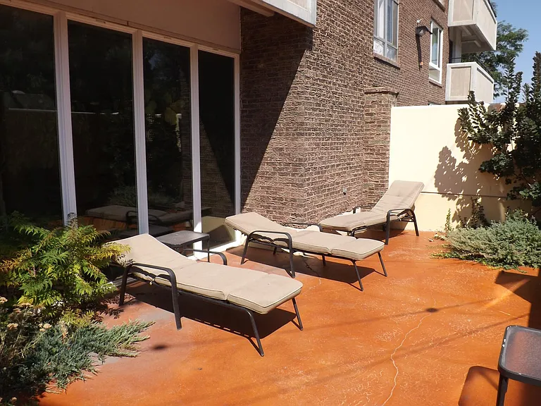 Relaxation area outside of the pool.