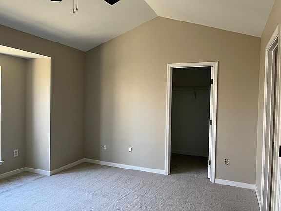 Primary Bedroom with walk-in closet