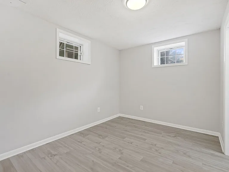 bottom floor - possible in-law suite - bedroom with ensuite bathroom