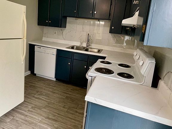 All new hardware, backsplash, brand new dishwasher, updated cabinets and countertops