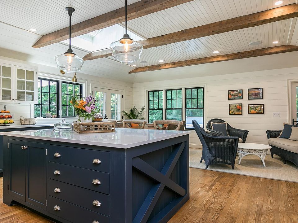 HUGE chef's kitchen is an entertainer's DREAM! This kitchen features a 48" professional-grade Viking 6-burner stove with stove-top grill and 2 ovens, a Sub-Zero fridge, 2 Bosch dishwashers, 2 porcelain farmhouse sinks and 4 under-counter garbage and recy