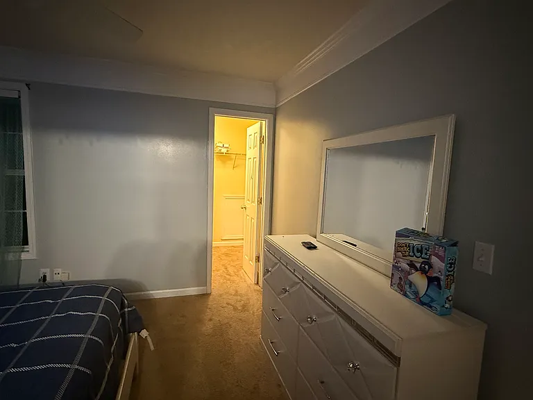 Second bedroom
King Bed
6 drawer dresser 
Walk-in closet
Smart Roku TV