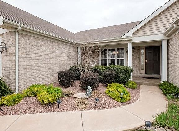 Welcoming walk way to a spacious front porch.