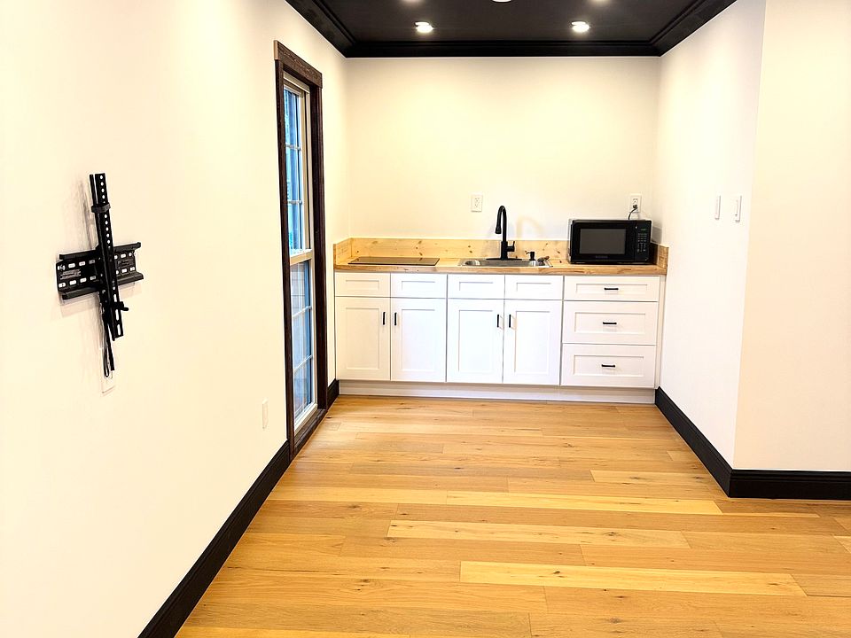 Brand new cooktop stove, sink, and microwave. Fridge will be moved in prior to tenant.