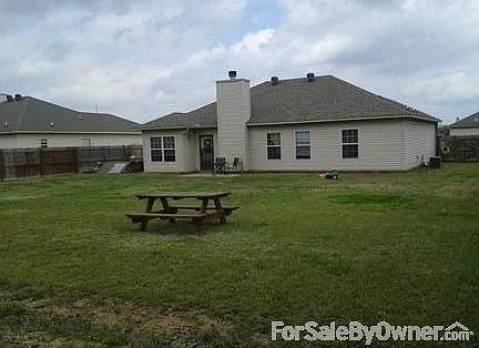 Back Yard with tornado shelter. : Yard is 75 feet wide by 185 feet long. The shelter is right next t