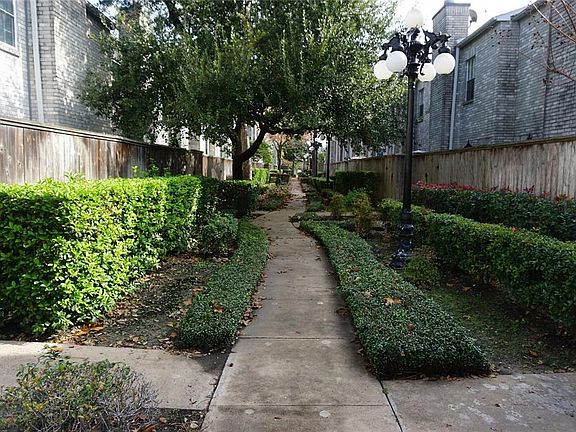 Well maintained grounds. This is the view to the street from the front door.