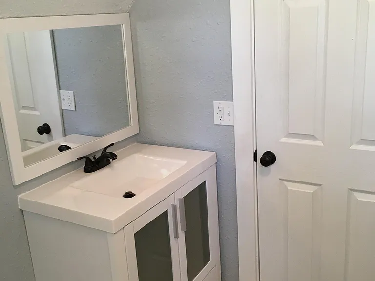 Upstairs bathroom with shower.