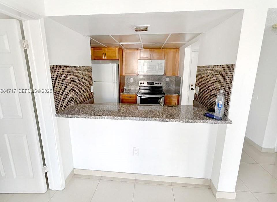 1st image of 6995 NW 186th St APT E211