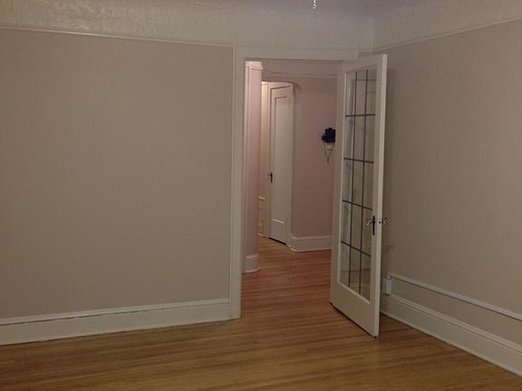 Living room with privacy door.