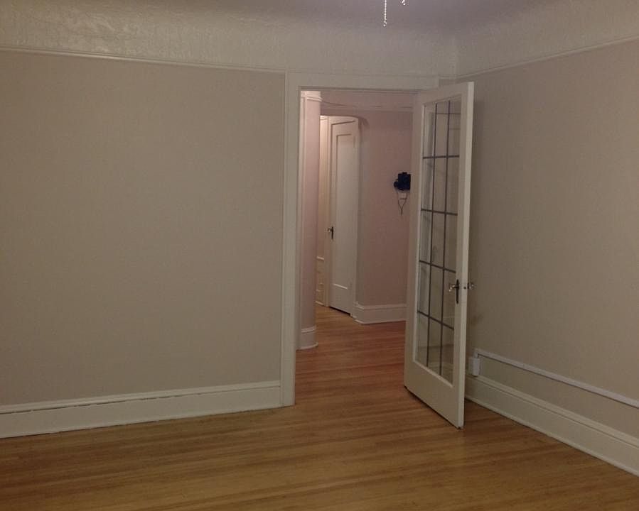 Living room with privacy door.