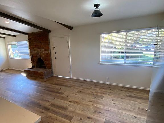 View from the Kitchen to the Front Door/dining/Living room
