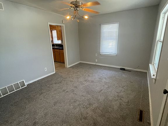 Living room- all new carpet through out home.