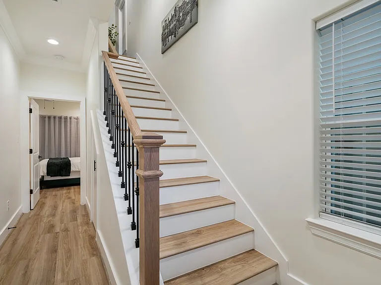 1st floor entry (garage access to the left, 1st floor bedroom ahead)