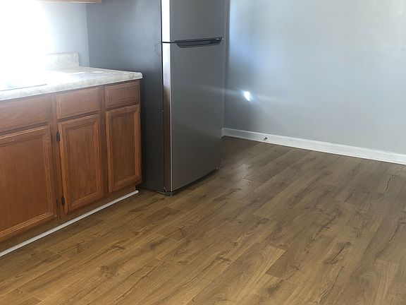 Kitchen. New flooring! New Frigidaire fridge!