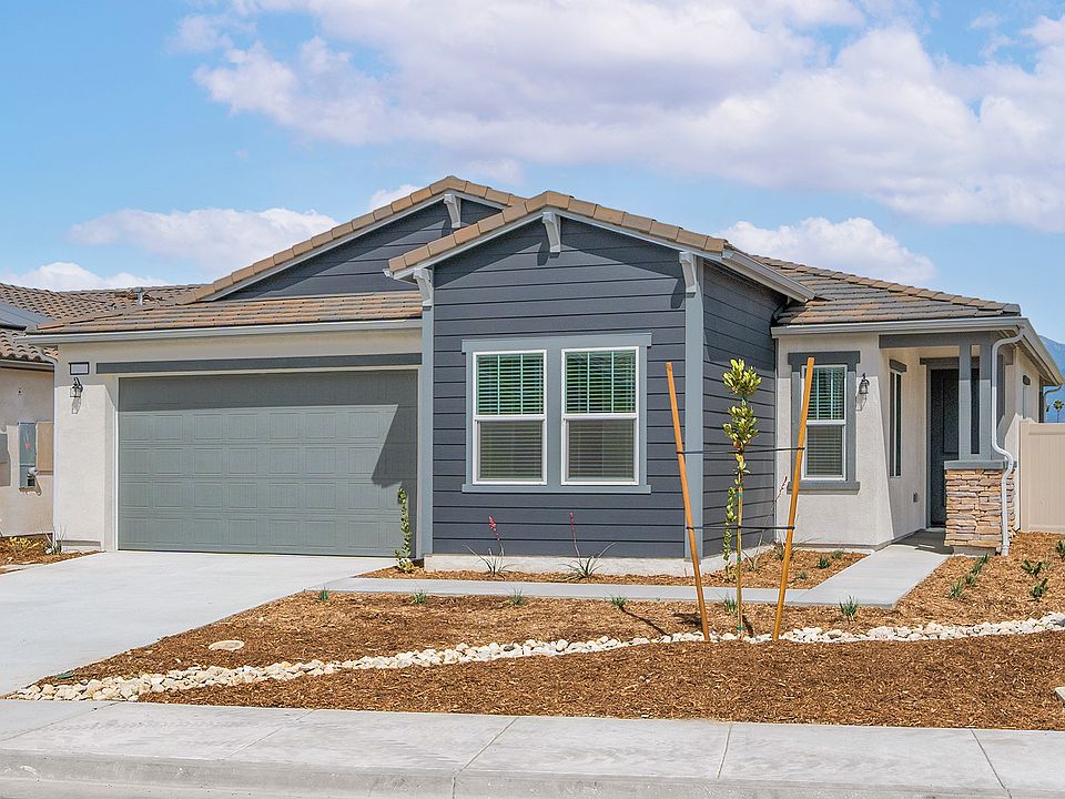 The Cottonwood is a beautiful single story home with siding.