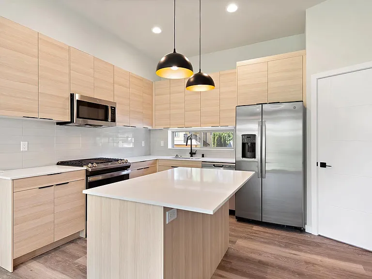 Soaring 11' high ceilings + spacious kitchen