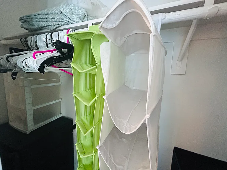 Closet has hangers, suit press, dresser drawers , yoga mat and weights