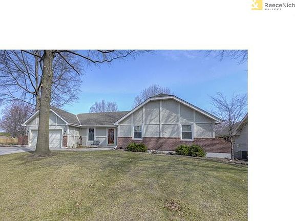 Great curb appeal with rock bed landscaping.  Corner lot!