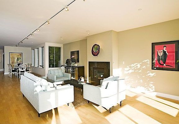 Another livingroom view w hardwood floors shown