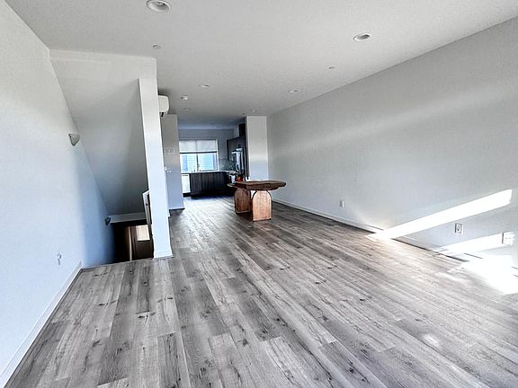 Living room, dining room and kitchen.