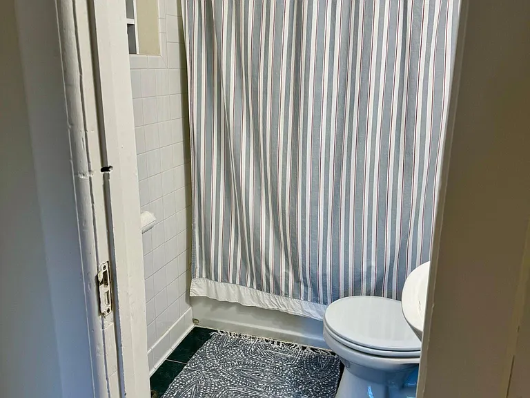 Full Bath - Tile throughout, bathtub, shower, pedestal sink, tile floor.