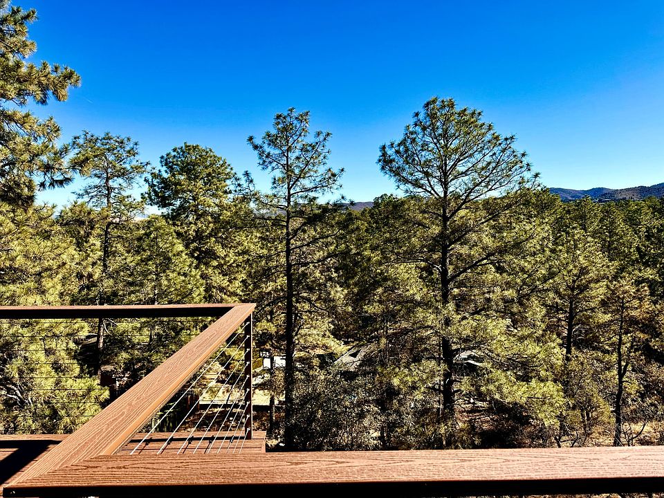 Massive brand new trax deck. Room for dining, lounge chairs, fire pit seating, bbq area and more.